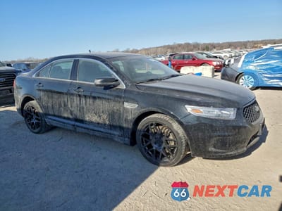 Czwarte zdjęcie samochodu z boku: 2014 FORD TAURUS POLICE INTERCEPTOR VIN:1FAHP2MT5EG127765 - miniatura