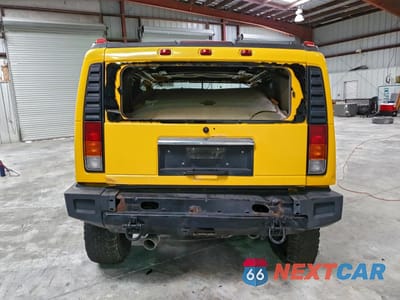 Zdjęcie 6 z 14 samochodu: 2003 HUMMER H2 VIN:5GRGN23UX3H144072 - miniatura