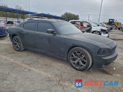 Czwarte zdjęcie samochodu z boku: 2006 DODGE CHARGER R/T VIN:2B3KA53H76H310690 - miniatura