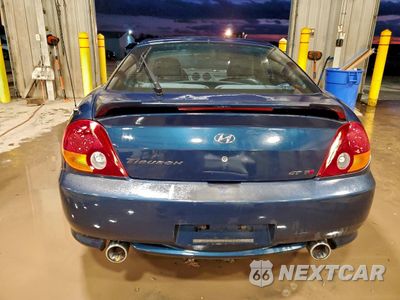 Zdjęcie 6 z 12 samochodu: 2003 HYUNDAI TIBURON GT VIN:KMHHN65F13U029035 - miniatura