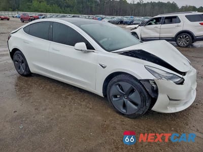 Czwarte zdjęcie samochodu z boku: 2020 TESLA MODEL 3 VIN:5YJ3E1EA5LF745287 - miniatura