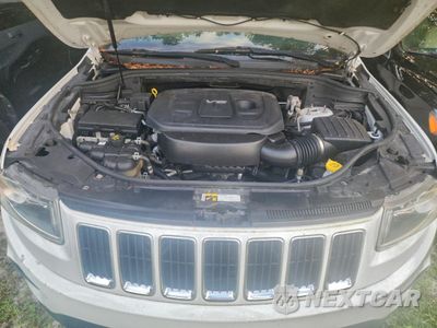Zdjęcie 7 z 11 samochodu: 2016 JEEP GRAND CHEROKEE LAREDO VIN:1C4RJEAGXGC451488 - miniatura