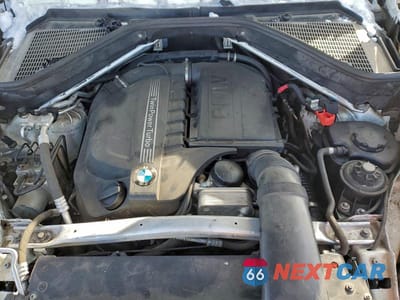 Zdjęcie 12 z 13 samochodu: 2013 BMW X5 XDRIVE35I VIN:5UXZV4C58D0B01110 - miniatura