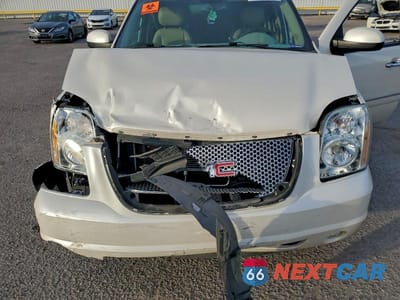 Zdjęcie 11 z 11 samochodu: 2013 GMC YUKON XL DENALI VIN:1GKS2MEF9DR336498 - miniatura