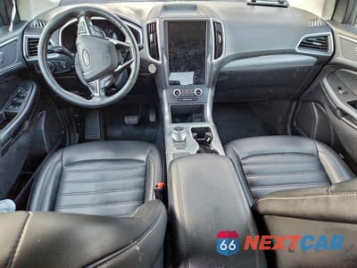 Zdjęcie 8 z 14 samochodu: 2021 FORD EDGE SEL VIN:2FMPK4J95MBA57176 - miniatura