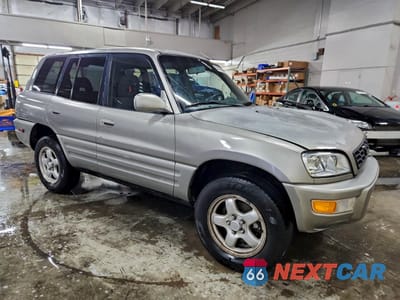 Czwarte zdjęcie samochodu z boku: 2000 TOYOTA RAV4 VIN:JT3HP10V9Y7171577 - miniatura