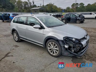 Czwarte zdjęcie samochodu z boku: 2017 VOLK GOLF ALLTR VIN:3VWH17AU1HM525570 - miniatura