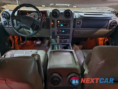 Zdjęcie 8 z 14 samochodu: 2003 HUMMER H2 VIN:5GRGN23UX3H144072 - miniatura