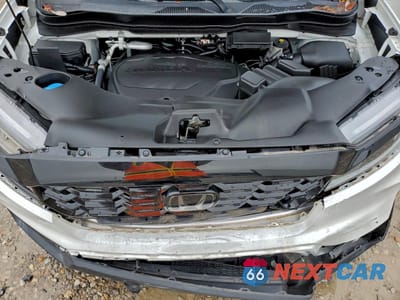 Zdjęcie 11 z 15 samochodu: 2022 HONDA PASSPORT ELITE VIN:5FNYF8H01NB015023 - miniatura