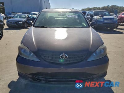 Piąte zdjęcie samochodu w środku: 2002 TOYOTA CAMRY LE VIN:JTDBF30K720044946 - miniatura