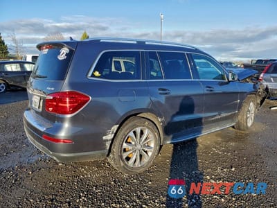 Trzecie zdjęcie samochodu z tyłu: 2015 MERCEDES-BENZ GL 450 4MATIC VIN:4JGDF6EE2FA506516 - miniatura