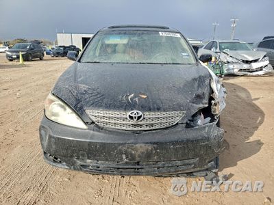 Piąte zdjęcie samochodu w środku: 2002 TOYOTA CAMRY LE VIN:JTDBF32K520024417 - miniatura