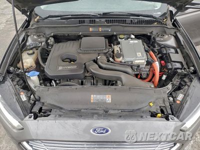 Zdjęcie 11 z 12 samochodu: 2013 FORD FUSION SE HYBRID VIN:3FA6P0LU7DR229422 - miniatura