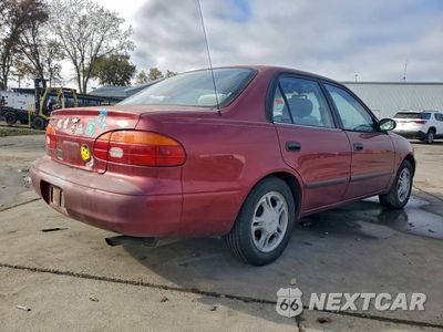 Trzecie zdjęcie samochodu z tyłu: 2000 CHEVROLET GEO PRIZM BASE VIN:1Y1SK5281YZ421313 - miniatura