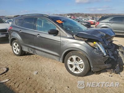 Czwarte zdjęcie samochodu z boku: 2016 FORD ESCAPE SE VIN:1FMCU9G92GUB37174 - miniatura