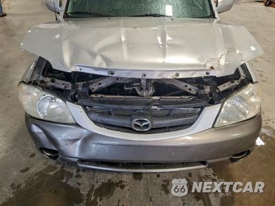 Zdjęcie 12 z 14 samochodu: 2005 MAZDA TRIBUTE S VIN:4F2CZ06125KM28733 - miniatura