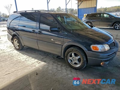 Czwarte zdjęcie samochodu z boku: 2002 PONTIAC MONTANA LUXURY VIN:1GMDX13E72D215537 - miniatura
