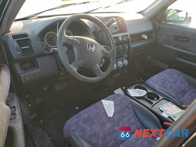 Zdjęcie 8 z 13 samochodu: 2004 HONDA CR-V LX VIN:JHLRD68404C023999 - miniatura