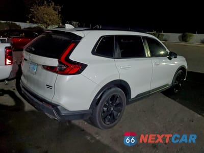 Trzecie zdjęcie samochodu z tyłu: 2023 HONDA CR-V SPORT TOURING VIN:2HKRS6H90PH803265 - miniatura