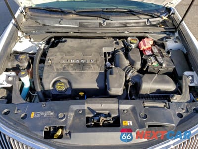 Zdjęcie 11 z 14 samochodu: 2015 LINCOLN MKS VIN:1LNHL9EKXFG603705 - miniatura