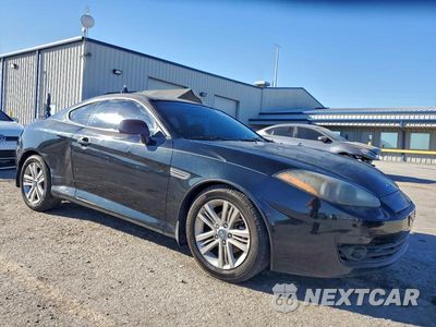 Czwarte zdjęcie samochodu z boku: 2007 HYUNDAI TIBURON GS VIN:KMHHM66D27U259995 - miniatura