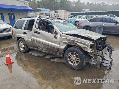Czwarte zdjęcie samochodu z boku: 2003 JEEP GRAND CHEROKEE LAREDO VIN:1J4GW48SX3C567677 - miniatura