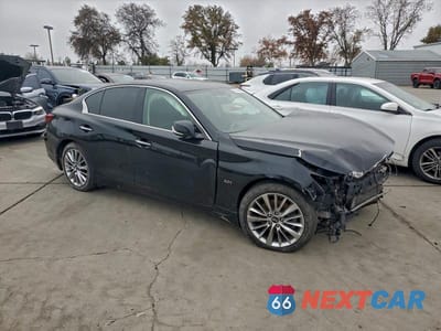 Czwarte zdjęcie samochodu z boku: 2018 INFINITI Q50 PURE VIN:JN1CV7AP0JM241170 - miniatura