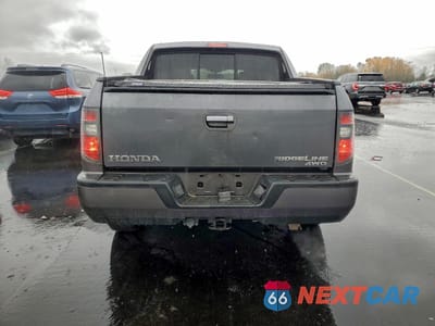 Zdjęcie 6 z 12 samochodu: 2014 HONDA RIDGELINE RTL VIN:5FPYK1F53EB002251 - miniatura