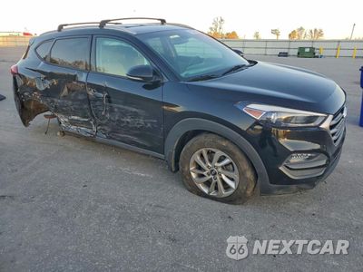 Czwarte zdjęcie samochodu z boku: 2017 HYUNDAI TUCSON LIMITED VIN:KM8J3CA44HU442049 - miniatura