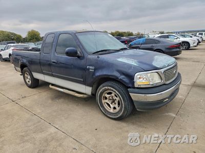 Czwarte zdjęcie samochodu z boku: 2001 FORD F150 VIN:1FTRX17W71NB00443 - miniatura