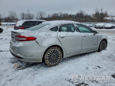 Trzecie zdjęcie samochodu z tyłu: 2017 FORD FUSION TITANIUM HEV VIN:3FA6P0RU5HR357431 - miniatura