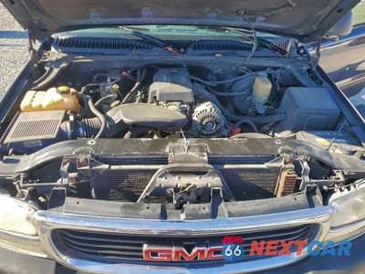 Zdjęcie 11 z 14 samochodu: 2000 GMC NEW SIERRA K1500 VIN:1GTEK14V8YZ295772 - miniatura