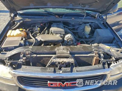Zdjęcie 11 z 14 samochodu: 2000 GMC NEW SIERRA K1500 VIN:1GTEK14V8YZ295772 - miniatura