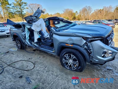 Czwarte zdjęcie samochodu z boku: 2024 GMC CANYON AT4 VIN:1GTP6DEK6R1245052 - miniatura