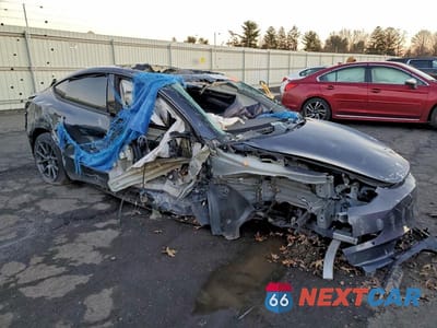 Czwarte zdjęcie samochodu z boku: 2022 TESLA MODEL 3 VIN:5YJ3E1EB7NF127173 - miniatura