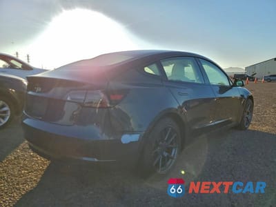 Trzecie zdjęcie samochodu z tyłu: 2021 TESLA MODEL 3 VIN:5YJ3E1EA5MF994223 - miniatura