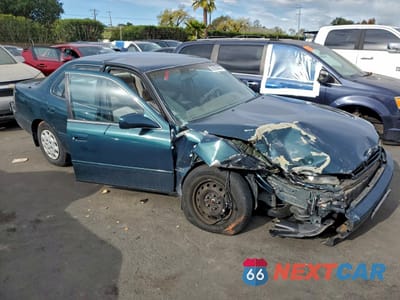 Czwarte zdjęcie samochodu z boku: 1996 TOYOTA CAMRY DX VIN:4T1BG12K2TU713497 - miniatura