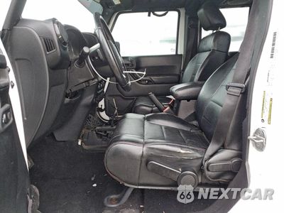 Zdjęcie 7 z 12 samochodu: 2012 JEEP WRANGLER UNLIMITED SAHARA VIN:1C4BJWEG4CL282872 - miniatura