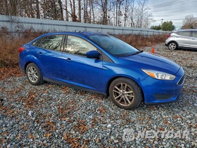 Czwarte zdjęcie samochodu z boku: 2018 FORD FOCUS SE VIN:1FADP3F20JL214614 - miniatura
