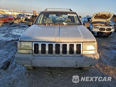 Piąte zdjęcie samochodu w środku: 1997 JEEP GRAND CHEROKEE LAREDO VIN:1J4GZ58S9VC709050 - miniatura