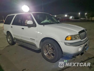 Czwarte zdjęcie samochodu z boku: 1999 LINCOLN NAVIGATOR VIN:5LMPU28A5XLJ39215 - miniatura