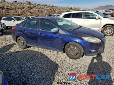 Czwarte zdjęcie samochodu z boku: 2012 FORD FOCUS SE VIN:1FAHP3F20CL163376 - miniatura
