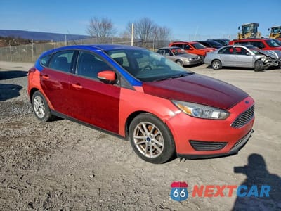 Czwarte zdjęcie samochodu z boku: 2017 FORD FOCUS SE VIN:1FADP3K26HL327645 - miniatura