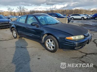 Czwarte zdjęcie samochodu z boku: 1999 OLDSMOBILE ALERO GL VIN:1G3NL52T5XC313636 - miniatura