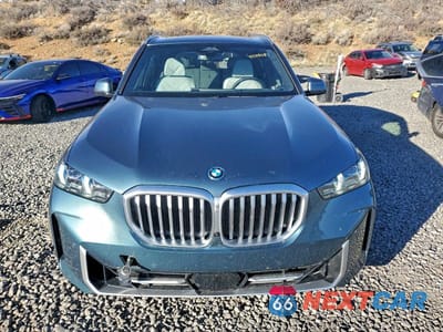 Piąte zdjęcie samochodu w środku: 2026 BMW X5 XDRIVE50E VIN:5UX43EU01T9120789 - miniatura