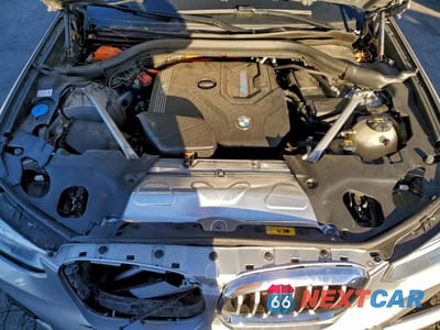 Zdjęcie 12 z 13 samochodu: 2021 BMW X3 XDRIVE30E VIN:5UXTS1C09M9H15211 - miniatura