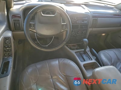 Zdjęcie 8 z 14 samochodu: 2000 JEEP GRAND CHEROKEE LAREDO VIN:1J4G248S0YC367975 - miniatura