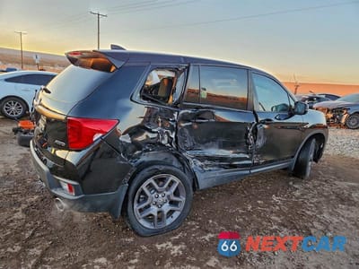 Trzecie zdjęcie samochodu z tyłu: 2023 HONDA PASSPORT EXL VIN:5FNYF8H5XPB034054 - miniatura