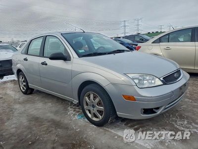 Czwarte zdjęcie samochodu z boku: 2005 FORD FOCUS ZX4 VIN:1FAFP34N05W170673 - miniatura