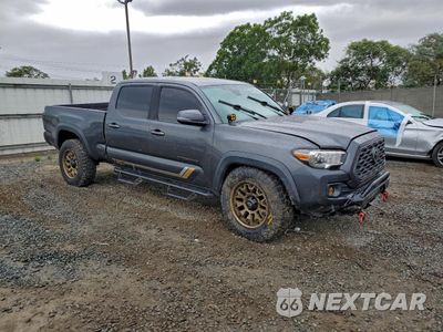 Czwarte zdjęcie samochodu z boku: 2020 TOYOTA TACOMA DOUBLE CAB VIN:3TMDZ5BN5LM094276 - miniatura